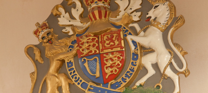 Royal coat of arms of the United Kingdom on the wall of a Family Court